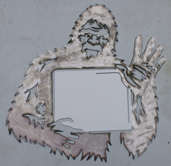 Bigfoot holding a sign